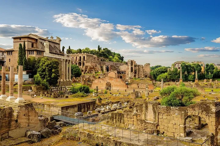Roman Forum temples, gardens and ruins beneath scattered clouds