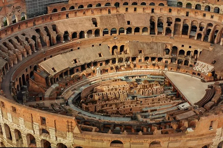 An aerial view reveals the Colosseum's oval arena and underground chambers.