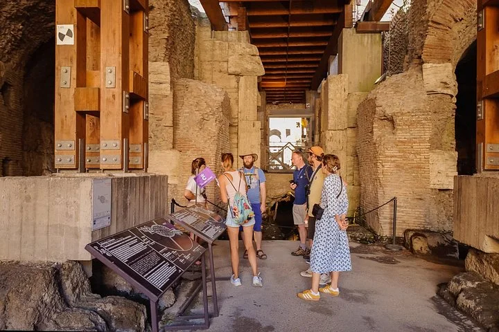 A Crown guide explains timber structures beneath the Colosseum arena.