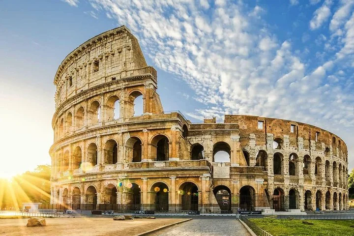 Sunburst beside the Colosseum exterior