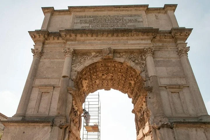 Upward view through the Arch of Titus