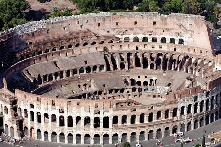 Elevated view over the Colosseum exterior and interior
