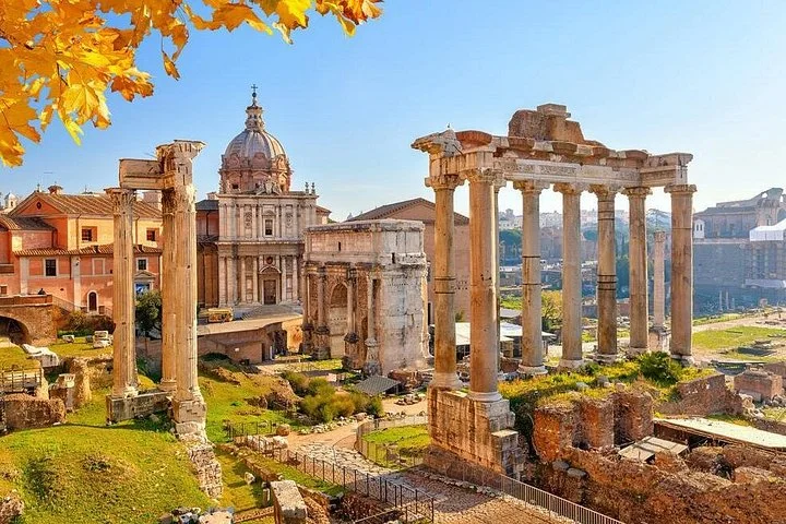 Roman Forum temples and lawns in bright daylight