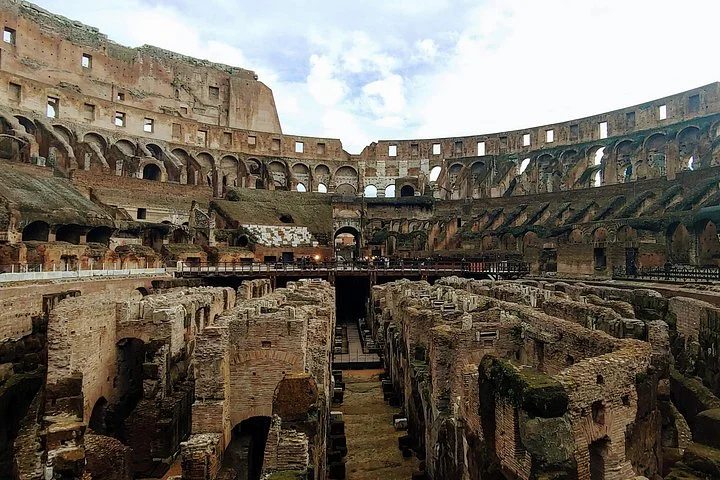 Exposed hypogeum walls viewed from above at the Colosseum