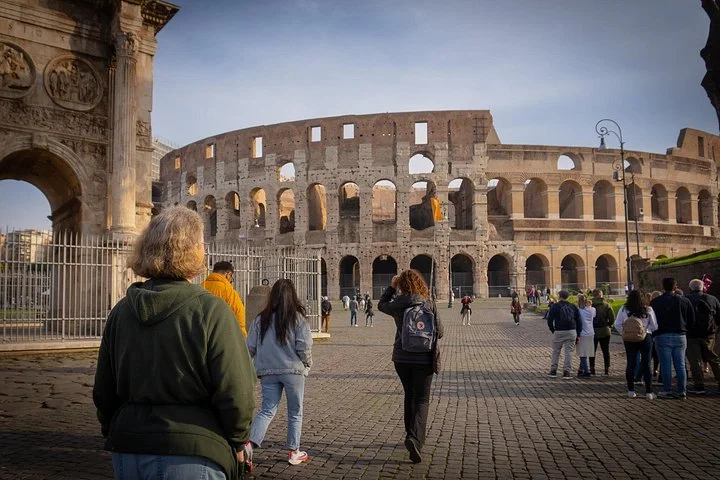 Visitors approaching the Colosseum through its public square
