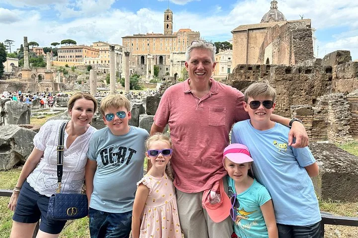 Adults and children among Roman Forum ruins