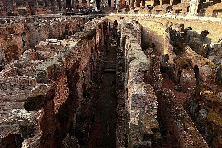 The Colosseum's narrow hypogeum chambers are viewed from above.