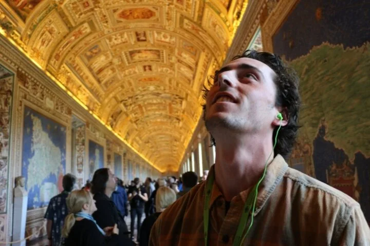 Visitor looking up in the Vatican Gallery of Maps
