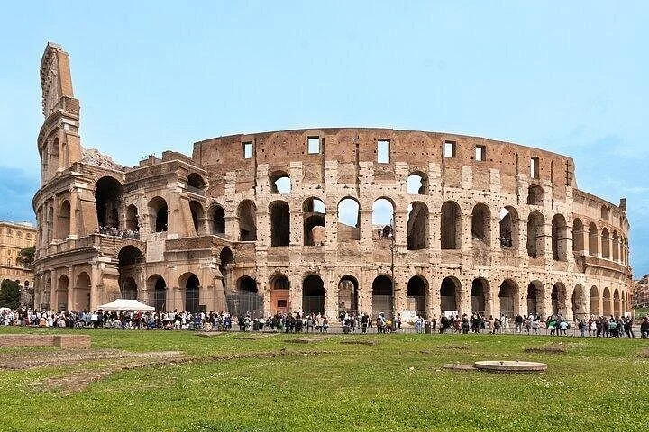 Colosseum exterior above green grass