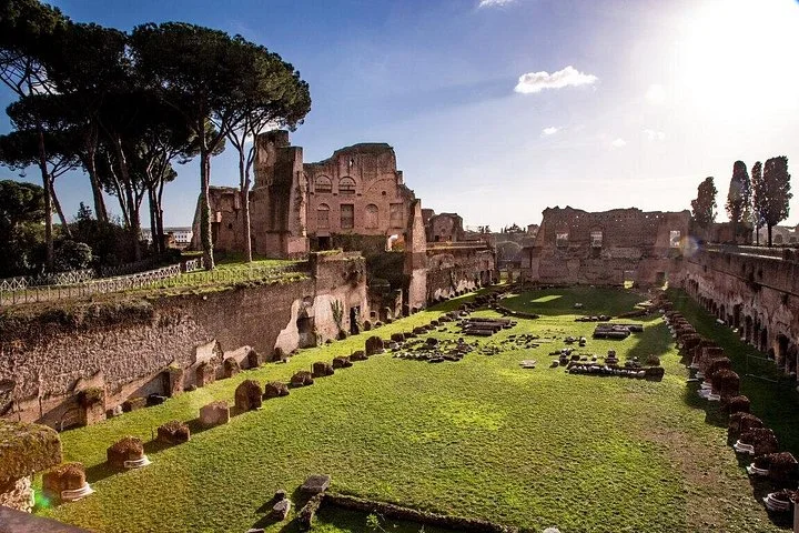 Long grassy stadium garden among Palatine Hill ruins
