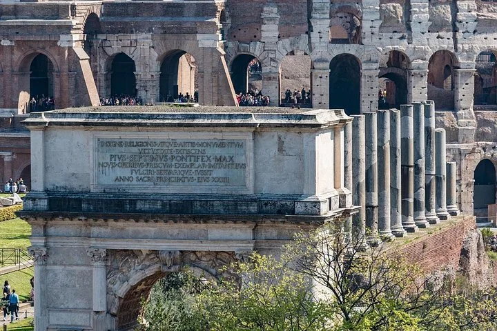 Arch of Titus and Colosseum exterior seen from above