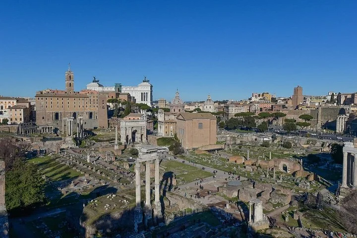 Broad Roman Forum panorama under a clear blue sky