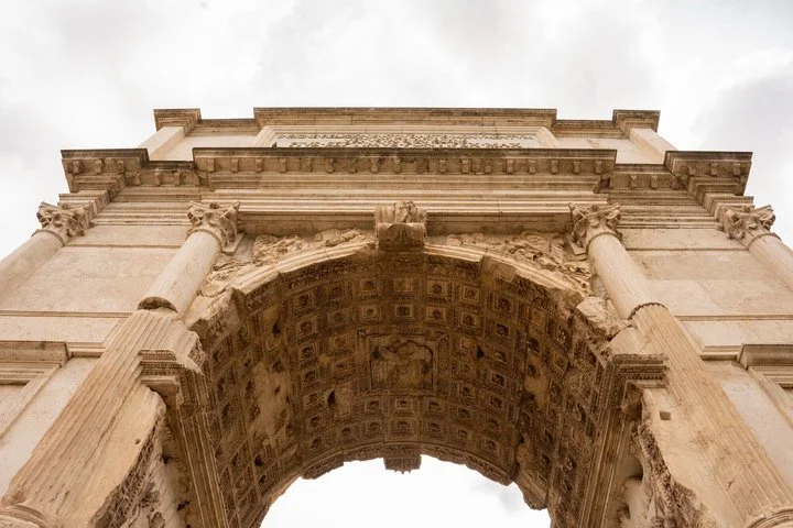 Upward view through the Arch of Titus