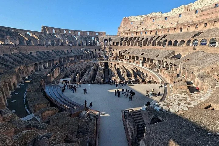 Arena platform and Colosseum seating viewed from a main-level overlook
