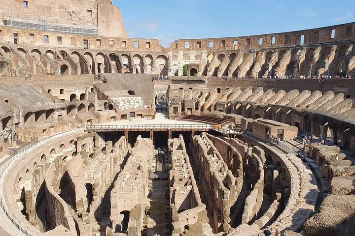 An upper-level panorama of the Colosseum interior