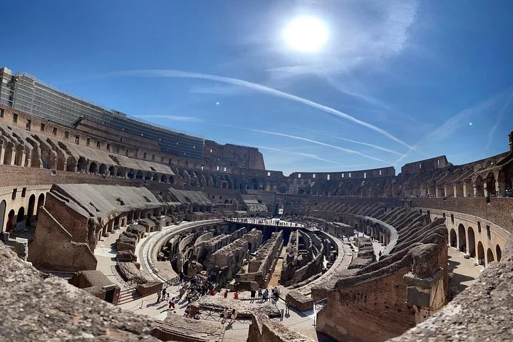 The Colosseum interior in strong sunlight