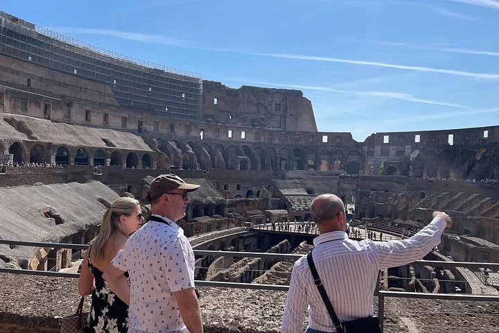 Visitors overlooking the Colosseum interior