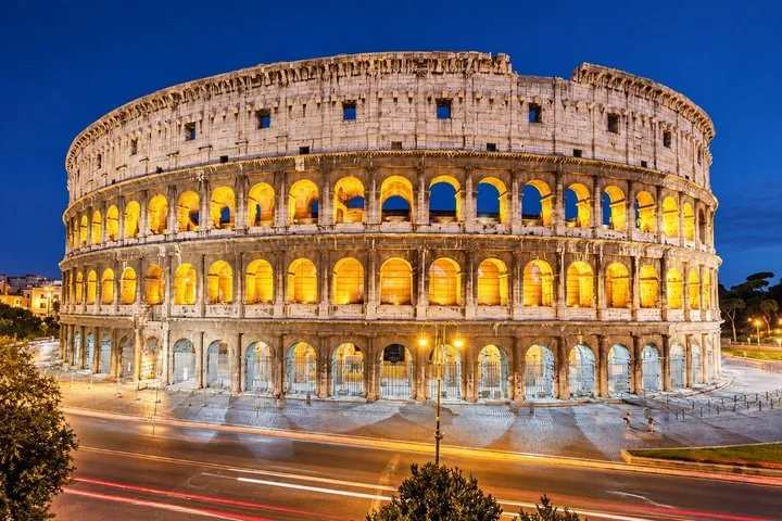 The illuminated Colosseum exterior at night