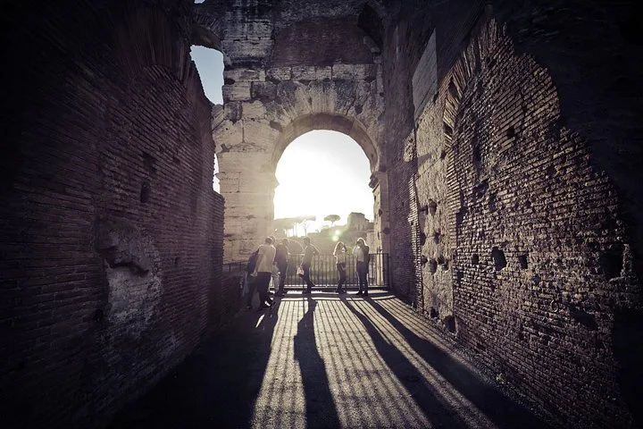 Sunlight through an above-ground Colosseum archway
