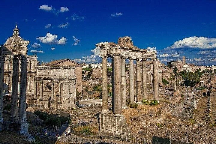 Roman Forum temple columns under blue skies