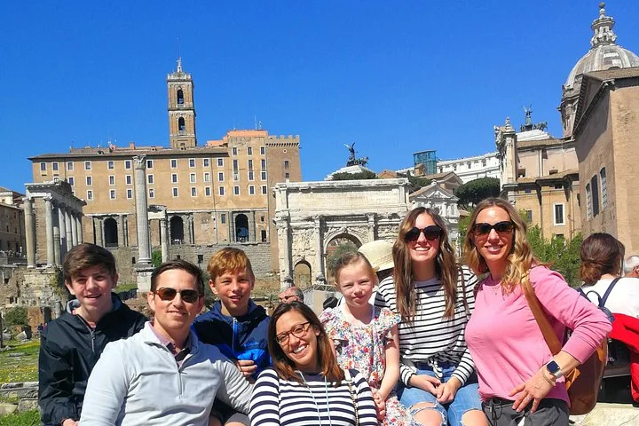 A family beside Roman Forum temples