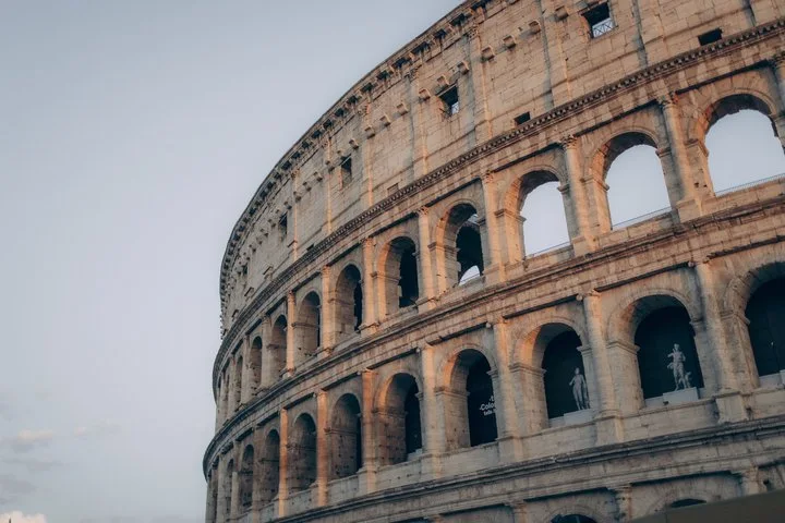 Looking upward along the Colosseum facade