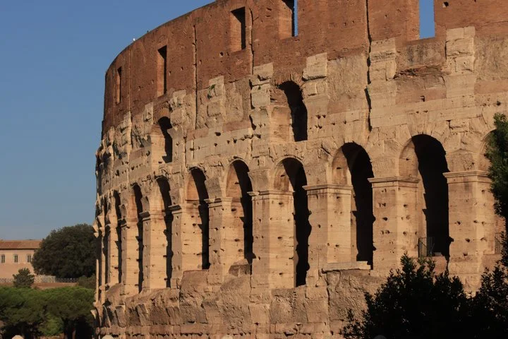 Warm light on the Colosseum’s brick outer wall