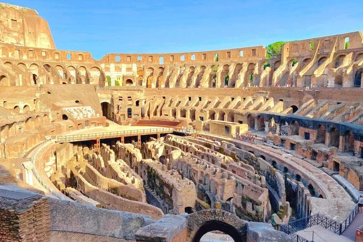 Golden light across the Colosseum interior