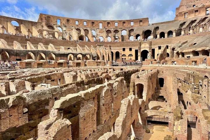 Exposed hypogeum walls seen from the arena edge