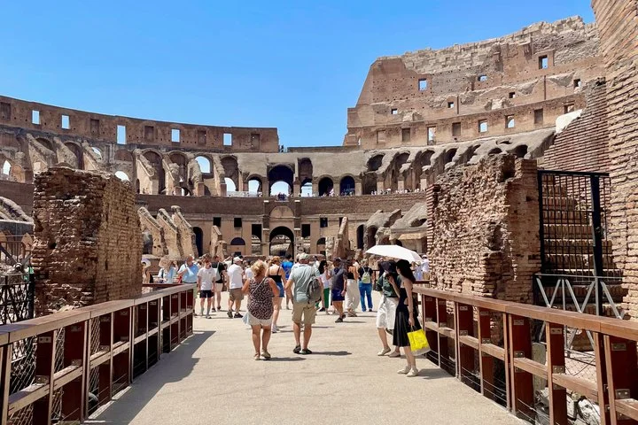 Visitors walking through the arena entrance