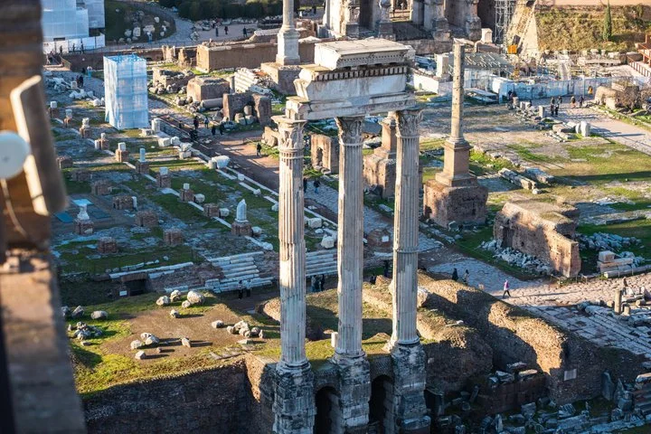 Ancient columns standing over Roman Forum ruins