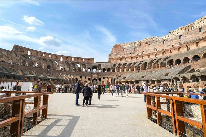 Visitors entering the Colosseum arena floor
