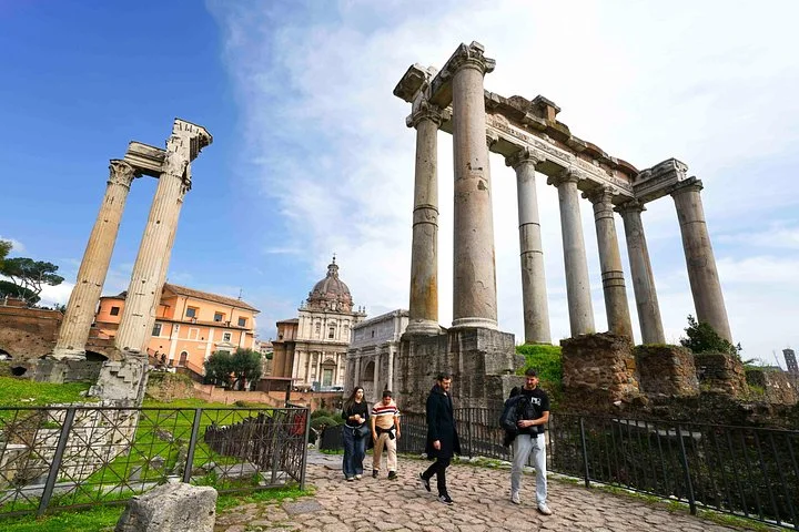 Visitors near the Temple of Saturn in the Roman Forum