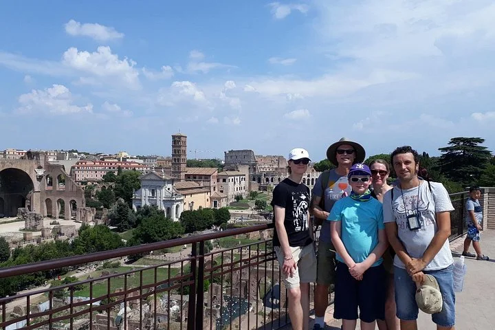 Visitors overlooking the Roman Forum from Palatine Hill