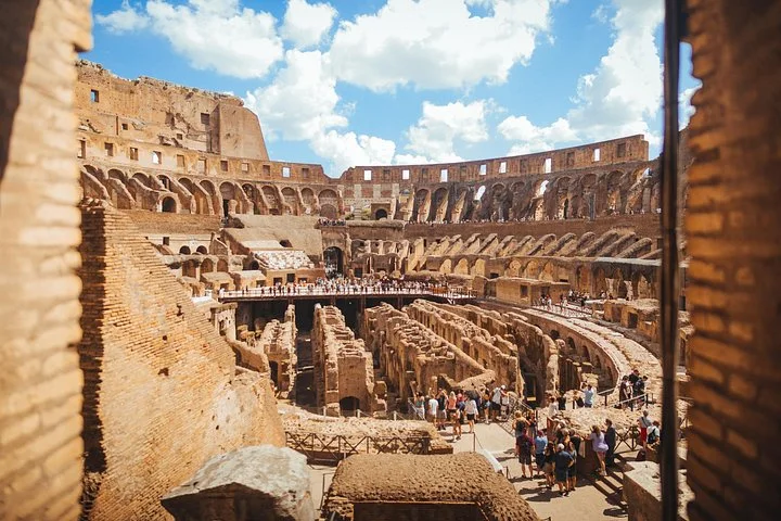 The Colosseum interior framed by an upper arch