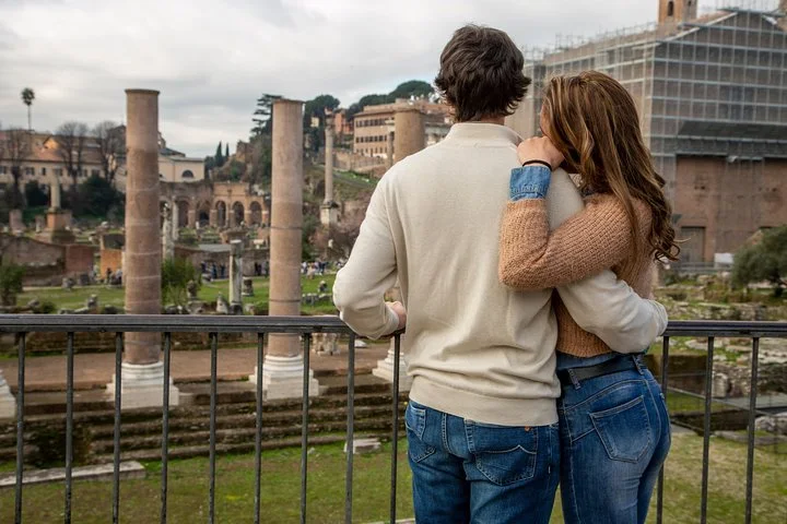 A couple overlooking Roman Forum ruins