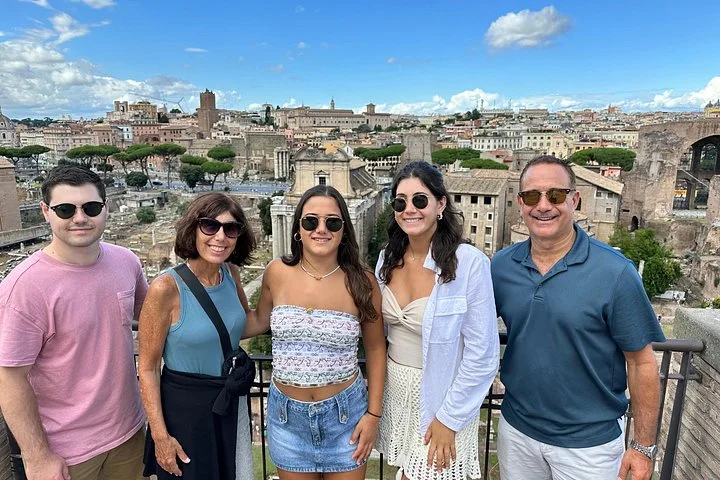 Visitors overlooking the Roman Forum from Palatine Hill