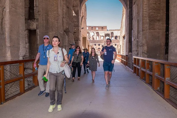 Visitors walking through the arena entrance passage