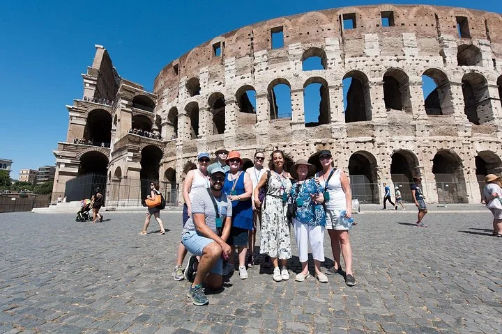 A group on the square beside the Colosseum
