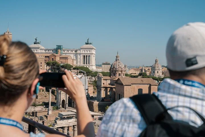 Visitors photographing the Roman Forum from above