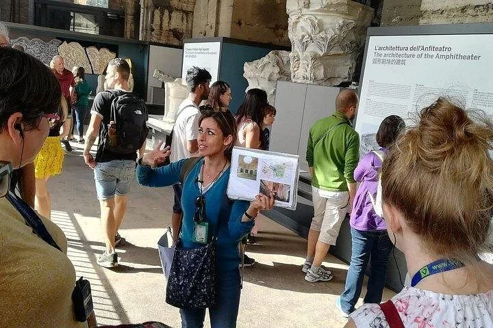A guide explaining exhibits inside the Colosseum