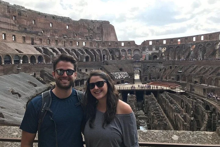 A couple at a Colosseum interior viewpoint