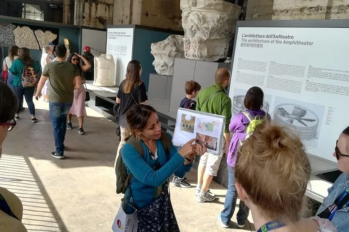 A guide explaining displays inside the Colosseum