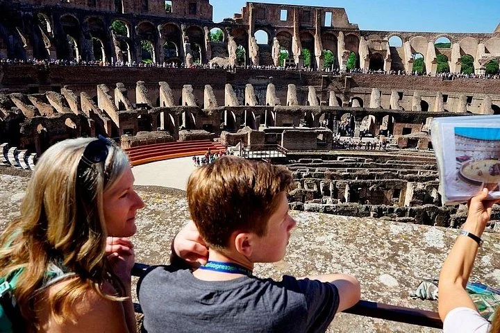 Visitors following an illustrated explanation of the Colosseum