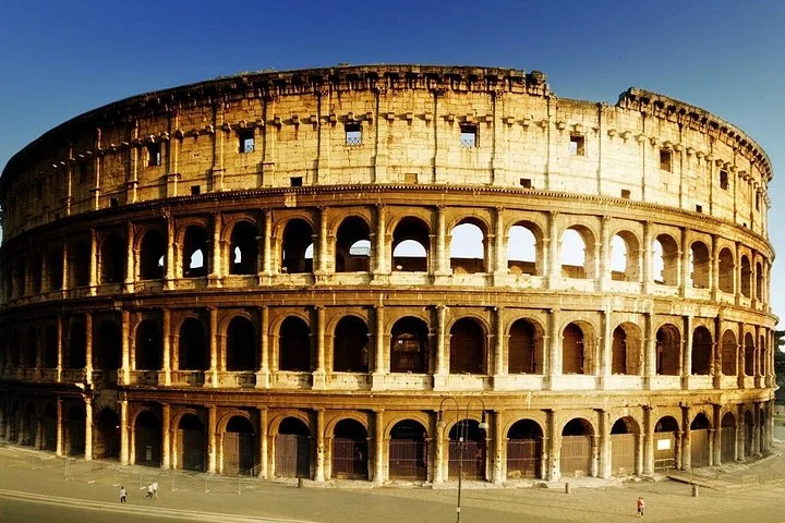 Golden light on the Colosseum’s outer facade