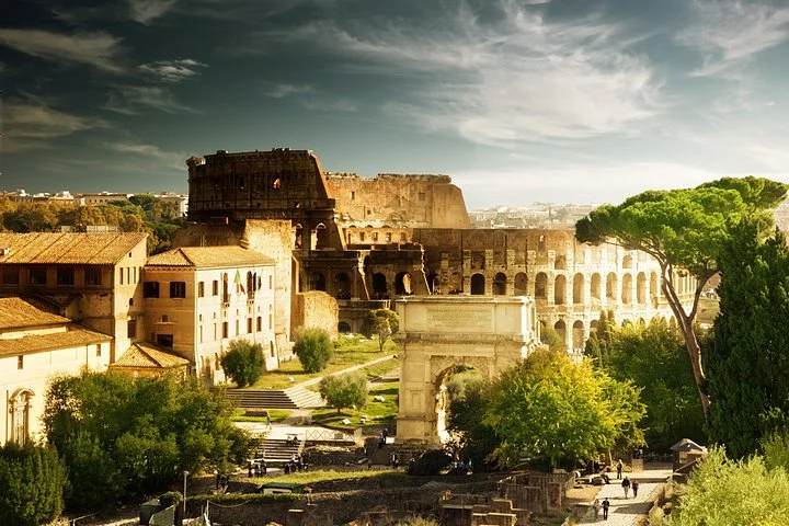 The Colosseum and Arch of Constantine amid trees