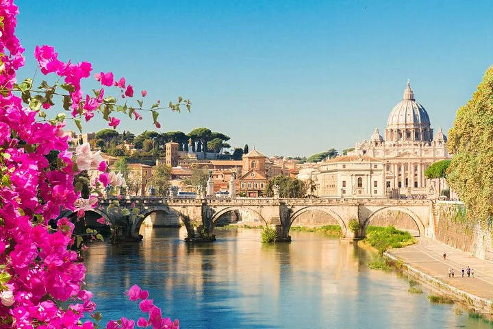 Saint Peter’s dome beyond the Tiber River