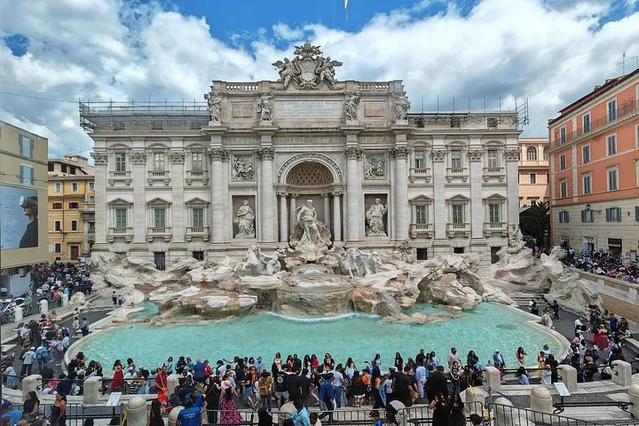 The Trevi Fountain and visiting crowds