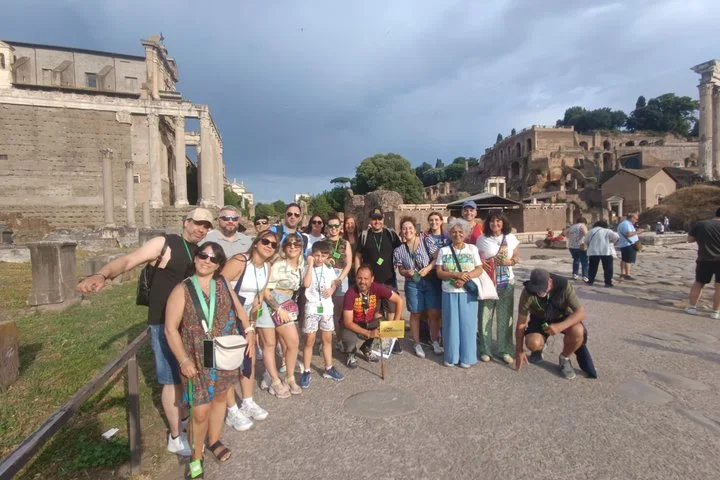 A guided group standing in the Roman Forum