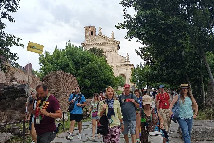 A group walking through the Roman Forum